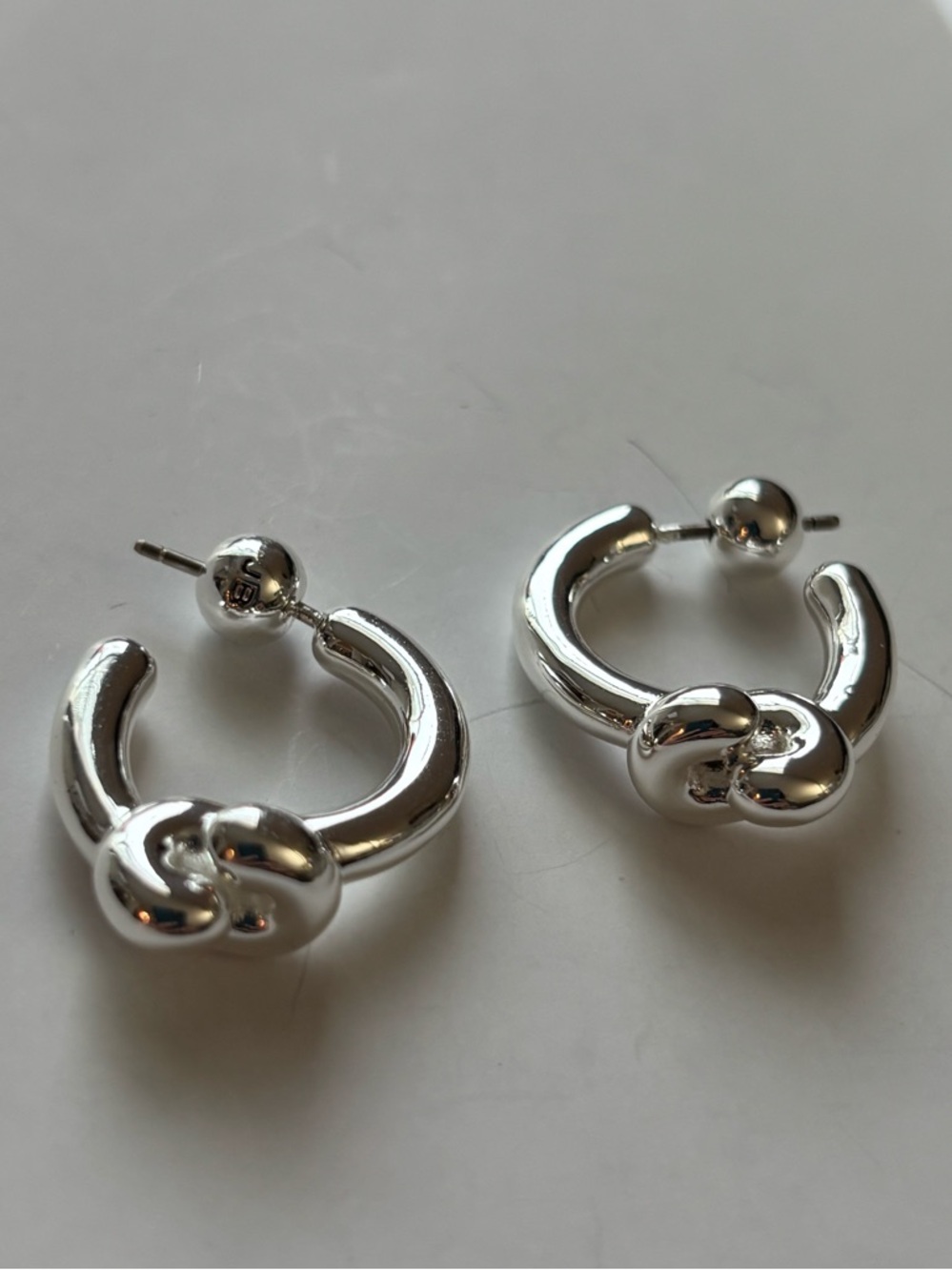 NWOT Jenny Bird Silver Knotted Hoop Earrings